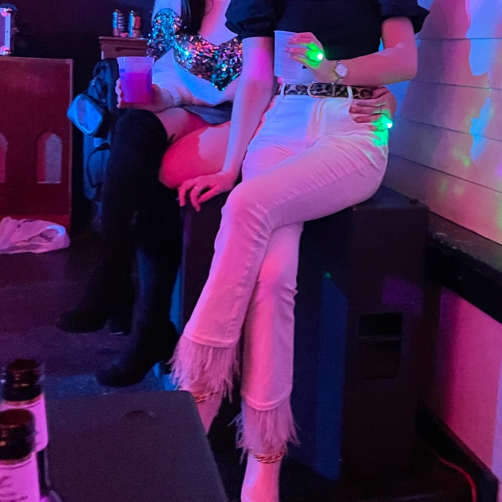 White feather jeans!